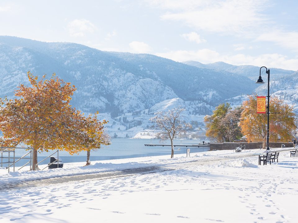 Scenic winter view of Skaha Lake and mountains after a snowstorm